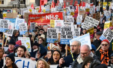 Nursing staff and supporters march from University College Hospital to Downing Street on January 18
