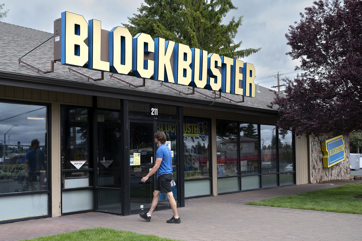 <i>David Becker/ZUMA Press Wire/ZUMAPRESS.com</i><br/>A man returns rented DVDs to the last remaining Blockbuster video store is seen in Bend