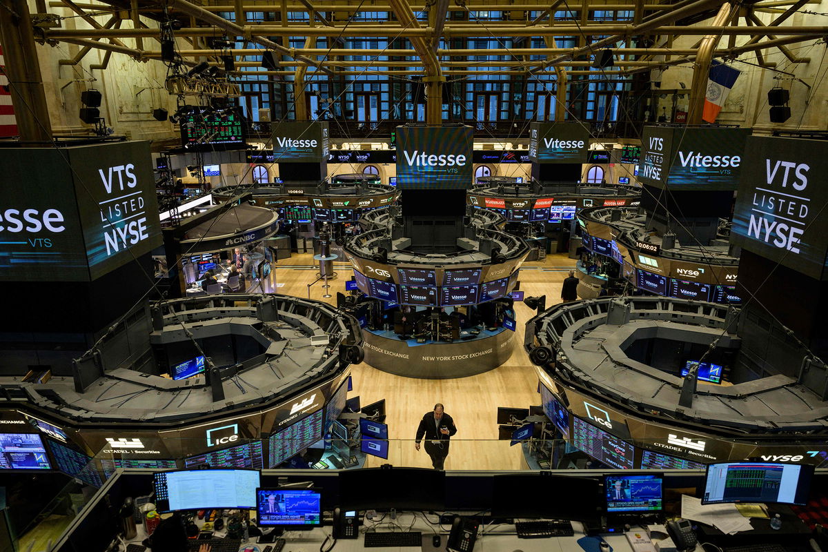 <i>Angela Weiss/AFP/Getty Images/FILE</i><br/>Companies have been eager to please Wall Street by repurchasing shares and boosting dividends for shareholders. Pictured is the New York Stock Exchange on January 18.