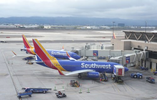Southwest Airlines planes are seen here parked at Gates D4 and D6 in Terminal 4 of the Sky Harbor International Airport on December 30