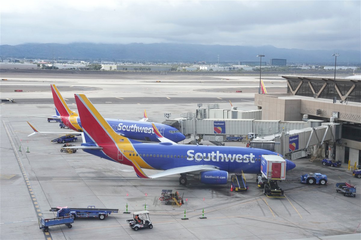 <i>Kirby Lee/AP</i><br/>Southwest Airlines planes are seen here parked at Gates D4 and D6 in Terminal 4 of the Sky Harbor International Airport on December 30