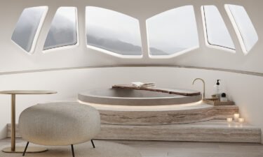 The cockpit has been converted into a large bathroom with additional portholes.