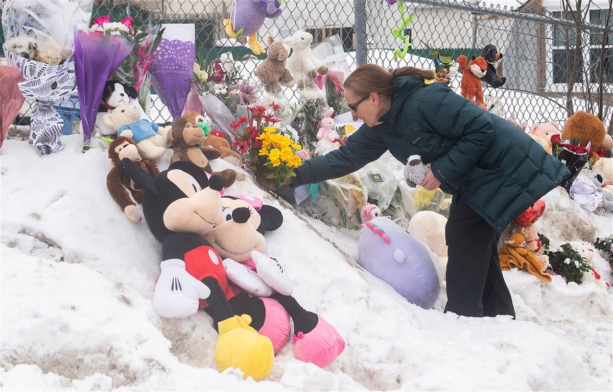 <i>Graham Hughes/The Canadian Press/AP</i><br/>Mourners placed flowers and stuffed animals at the site of the crash.