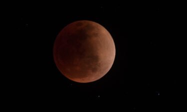 A "blood moon" is visible during a total lunar eclipse in the skies of Canta
