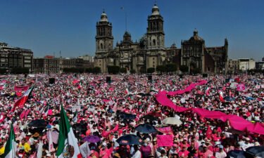 People protest against recent reforms pushed by Mexican President Andres Manuel Lopez Obrador in Mexico City.