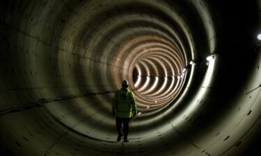 A worker stands in the tunnel of the North-South subway line in Amsterdam on January 16