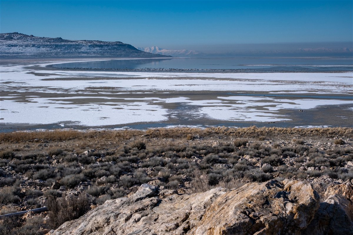 Part of the bed of the Great Salt Lake lies exposed.