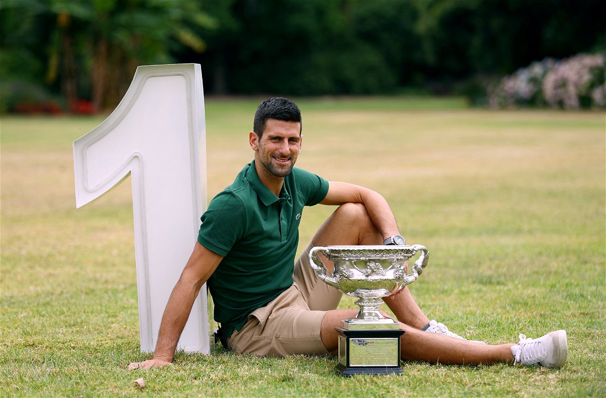 <i>Carl Recine/Reuters</i><br/>Novak Djokovic poses with the trophy after winning the Australian Open earlier in 2023.
