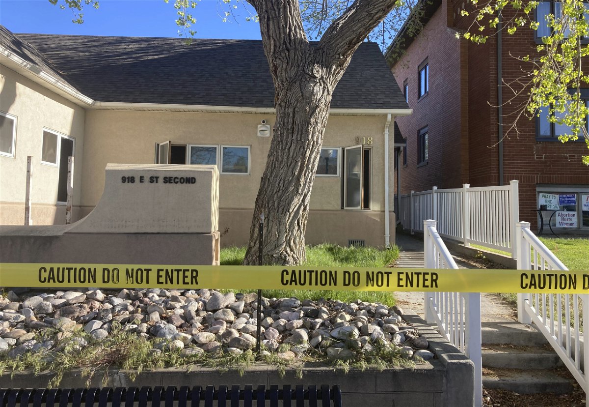 The fire-damaged Wellspring Health Access clinic is cordoned by tape on May 25, 2022, in in Casper, Wyo. A woman was arrested for setting fire to the building in Wyoming that was being renovated to house the state’s only full-service abortion clinic, authorities said Wednesday, March 22, 2023.