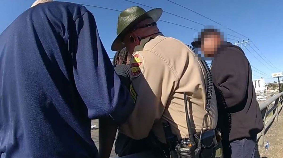 <i>Tennessee Highway Patrol/WSMV</i><br/>Two Tennessee Highway Patrol (THP) troopers helped save a man on the edge of the James Robertson Parkway Bridge who was threatening to jump off of it and onto the street below.