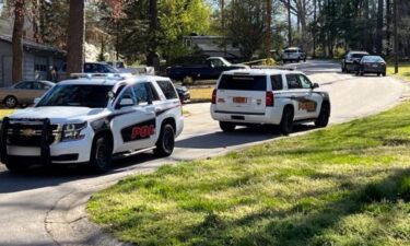 Cary police found a man with a self-inflicted gunshot wound Sunday after firefighters discovered human remains on the same property.