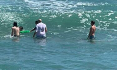 Martin County Sheriff's Office deputy Jake Blaszyk helped rescue four swimmers caught in a dangerous rip current.