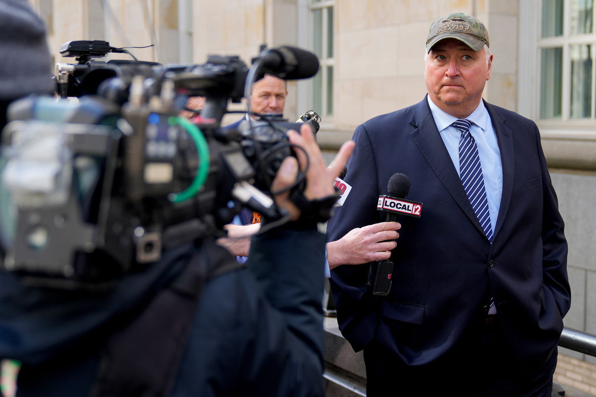 <i>Sam Greene/The Enquirer/USA Today Network</i><br/>Former Ohio state House Speaker Larry Householder is surrounded by reporters outside the Potter Stewart US Courthouse in downtown Cincinnati on March 9 after a jury found him guilty of racketeering conspiracy.