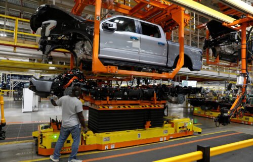 Ford will lose $3 billion on its sales of electric vehicles to consumers this year. Pictured is a Ford production plant in Dearborn