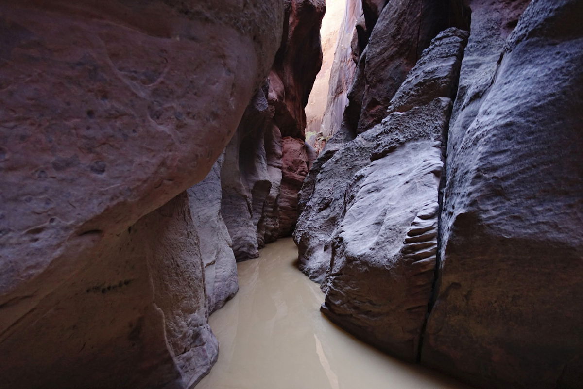 <i>Lennie Mahler/The Salt Lake Tribune/AP/FILE</i><br/>Two men are dead and one is hospitalized after being caught in a flash flood in the 16-mile-long slot canyon known as Buckskin Gulch in southern Utah.