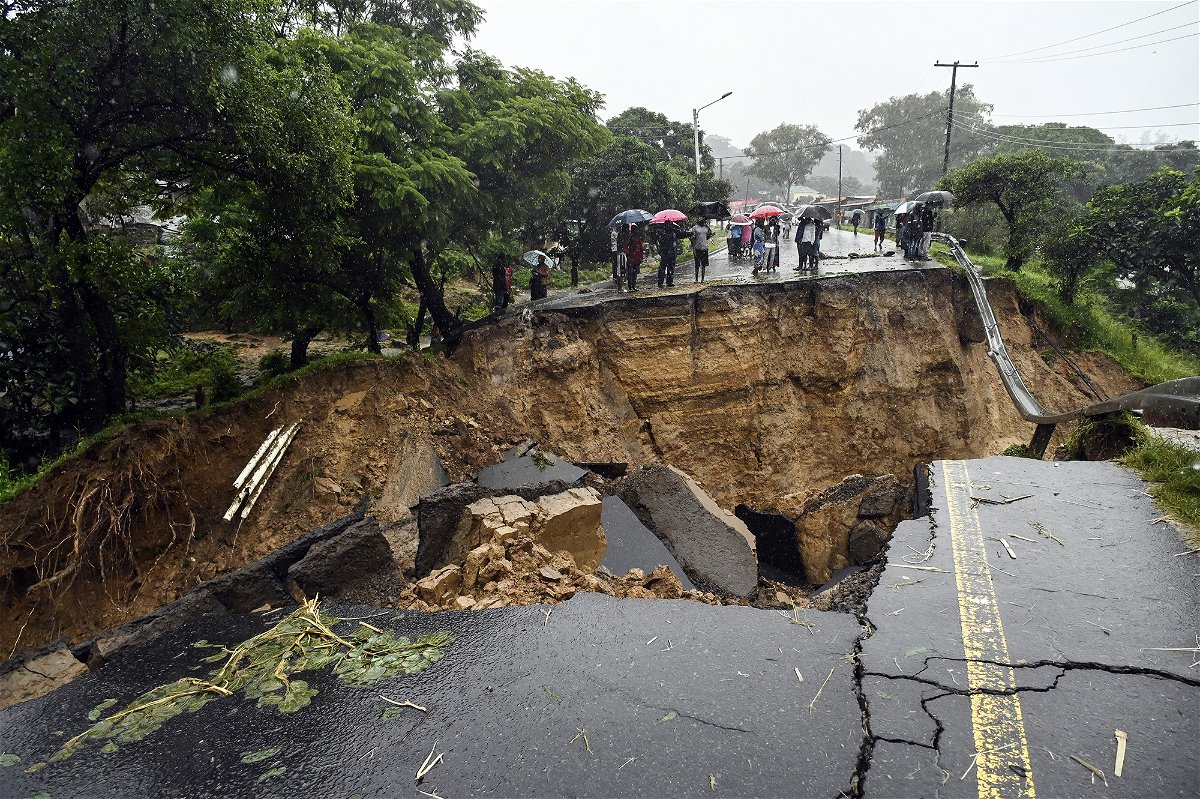 <i>Thoko Chikondi/AP</i><br/>A road connecting the two cities of Blantyre and Lilongwe is seen damaged following heavy rains caused by Tropical Cyclone Freddy in Blantyre