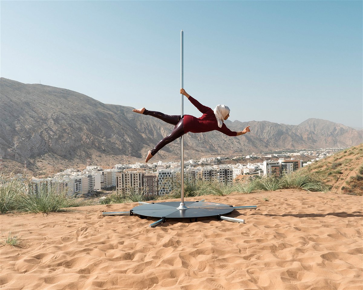 <i>Eman Ali</i><br/>An elegant portrait of a pole dancer in Oman celebrates a woman's strength in nature.