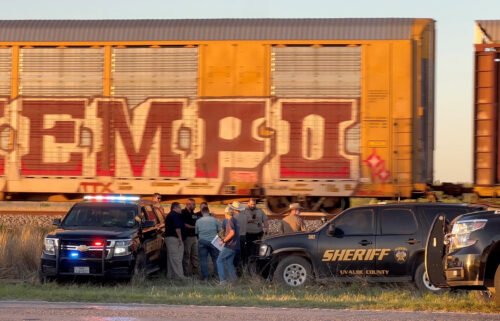Two migrants died and over a dozen more needed urgent medical attention after being found in train cars in Uvalde