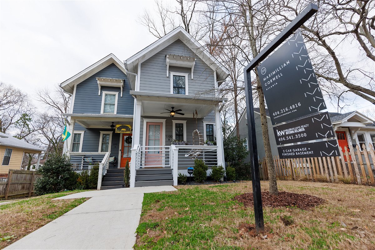 <i>Dustin Chambers/Bloomberg/Getty Images</i><br/>Mortgage applications fell for the third week in a row.  A house in Atlanta is here listed for sale on February 17.