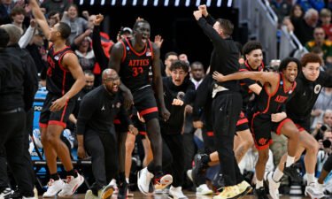 San Diego State Aztecs players celebrate defeating the Alabama Crimson Tide in the men's NCAA tournament third round on March 24 in Louisville