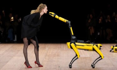Pictured here is a performance by a model with a robot at the Coperni Womenswear Fall Winter 2023-2024 show during Paris Fashion Week on March 3 in Paris