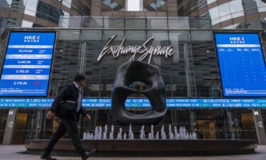 European and Asian markets were mixed on Thursday after the US Fed raised rates by a quarter-point. Pictured is the Hong Kong Stock Exchange on March 13.