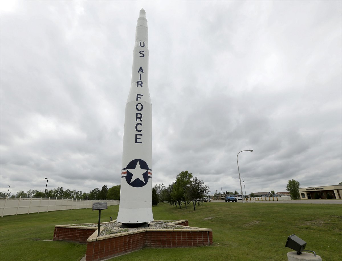 <i>Charlie Riedel/AP/FILE</i><br/>File photo showing a retired Minuteman 1 missile stands at the main entrance to Minot Air Force Base