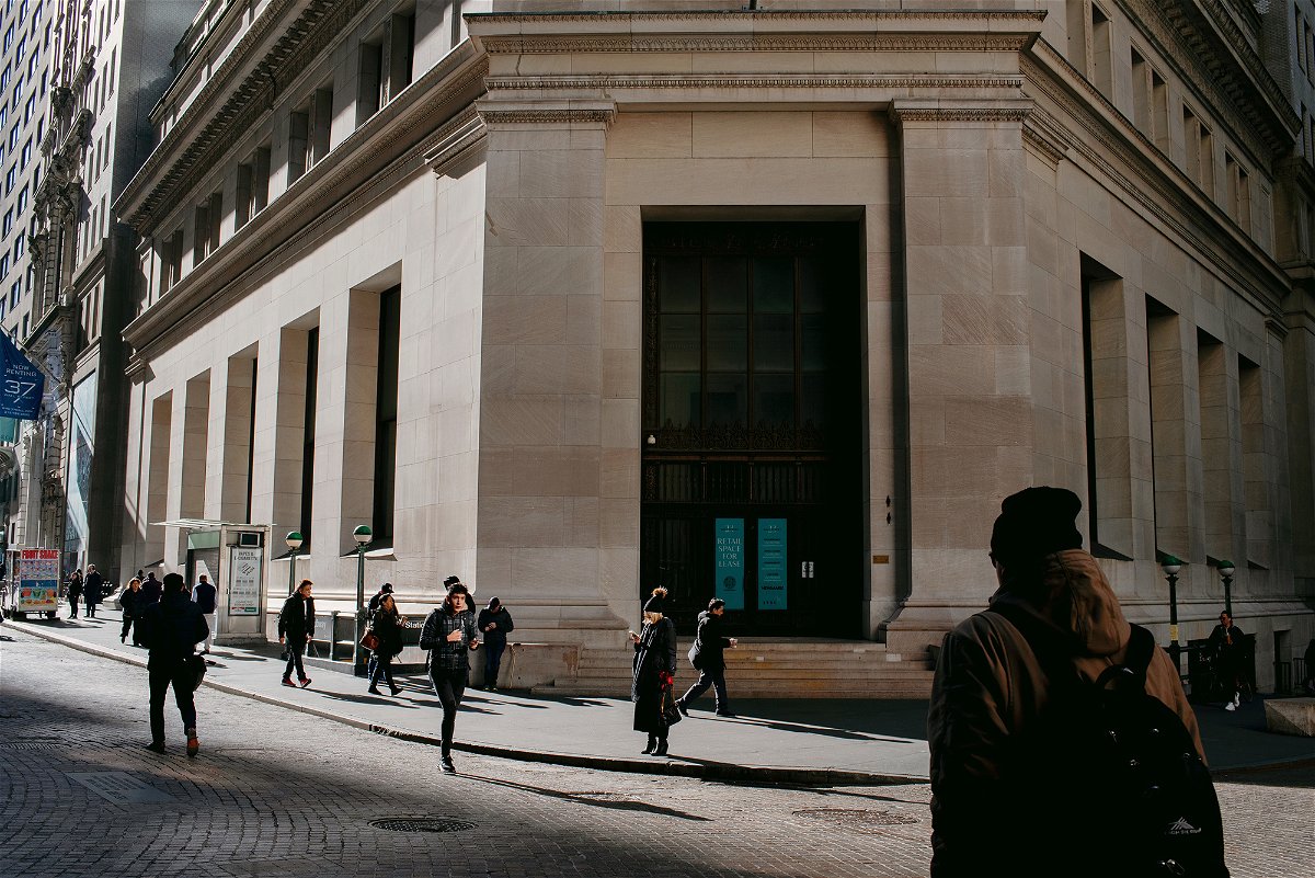 <i>Lila Barth/Bloomberg/Getty Images</i><br/>Pedestrians near the New York Stock Exchange in New York City on March 9.