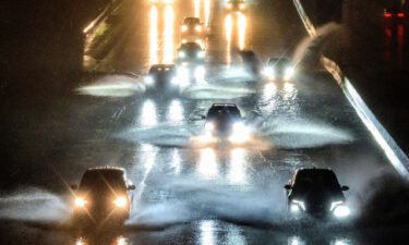 Drivers barrel into standing water on Interstate 101 in San Francisco on January 4.
