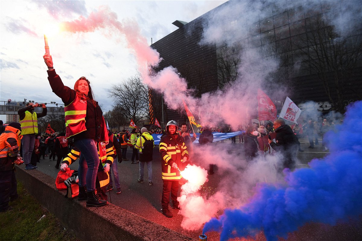<i>Bertrand Guy/AFP/Getty Images</i><br/>CGT unionists light flares on the ring road as they block the traffic to protest