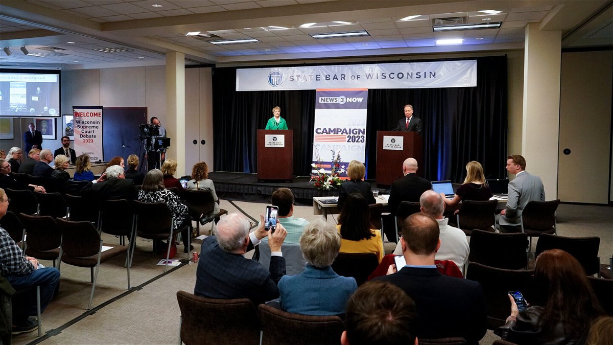 <i>Morry Gash/AP</i><br/>Wisconsin Supreme Court candidates Republican-backed Dan Kelly and Democratic-supported Janet Protasiewicz participate in a debate on March 21 in Madison