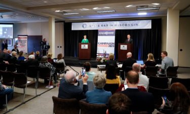 Wisconsin Supreme Court candidates Republican-backed Dan Kelly and Democratic-supported Janet Protasiewicz participate in a debate on March 21 in Madison