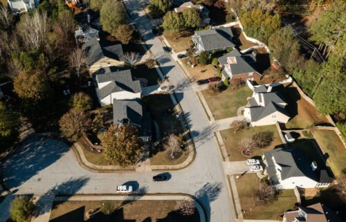 US home prices fell for the seventh month in a row in January. Pictured is a subdivision in Atlanta