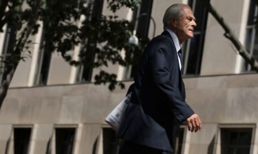 Former Trump White House trade adviser Peter Navarro arrives at a district court for a motion hearing in August 2022 in Washington