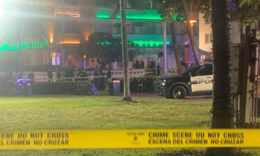 Police closed off an area on Ocean Drive in Miami Beach with crime scene tape after a shooting on March 17.