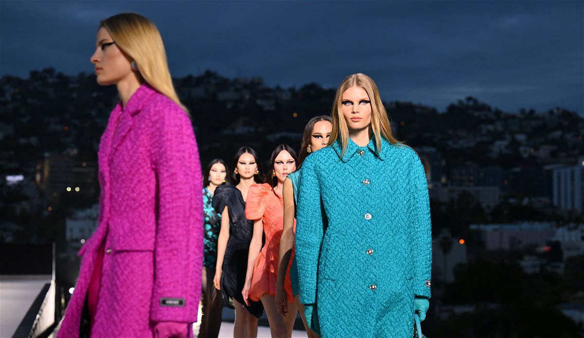 <i>Angela Weiss/AFP/Getty Images</i><br/>Versace's Fall-Winter 2023 collection was notably 90s-inspired.