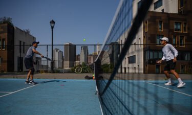 People play pickleball at a public court in Brooklyn