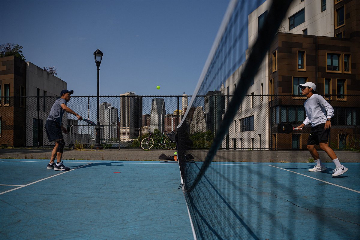 <i>Ed Jones/AFP/Getty Images</i><br/>People play pickleball at a public court in Brooklyn