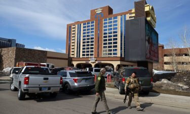 Law enforcement personnel are seen outside of the Hard Rock Casino and Hotel in Stateline