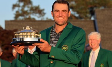 Scottie Scheffler earned the right to decide the menu for next year's Masters Champions Dinner. Scheffler poses with the Masters trophy during the Green Jacket Ceremony after winning the Masters at Augusta National Golf Club in April