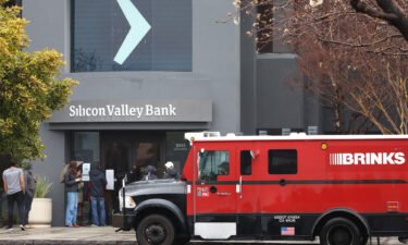 A Brinks armored truck sits parked in front of the shuttered Silicon Valley Bank headquarters on March 10