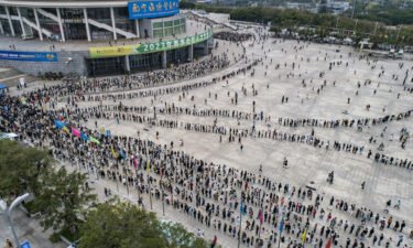 Rising youth unemployment underscores the challenges ahead for the new Chinese government to achieve its economic targets and maintain social stability. A large number of employment seekers line up outside a job fair in Nanning