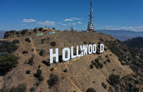 The Hollywood sign is seen as it is repainted in preparation for its 100th anniversary in 2023