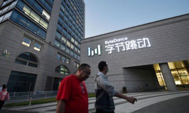 People walk past the headquarters of ByteDance