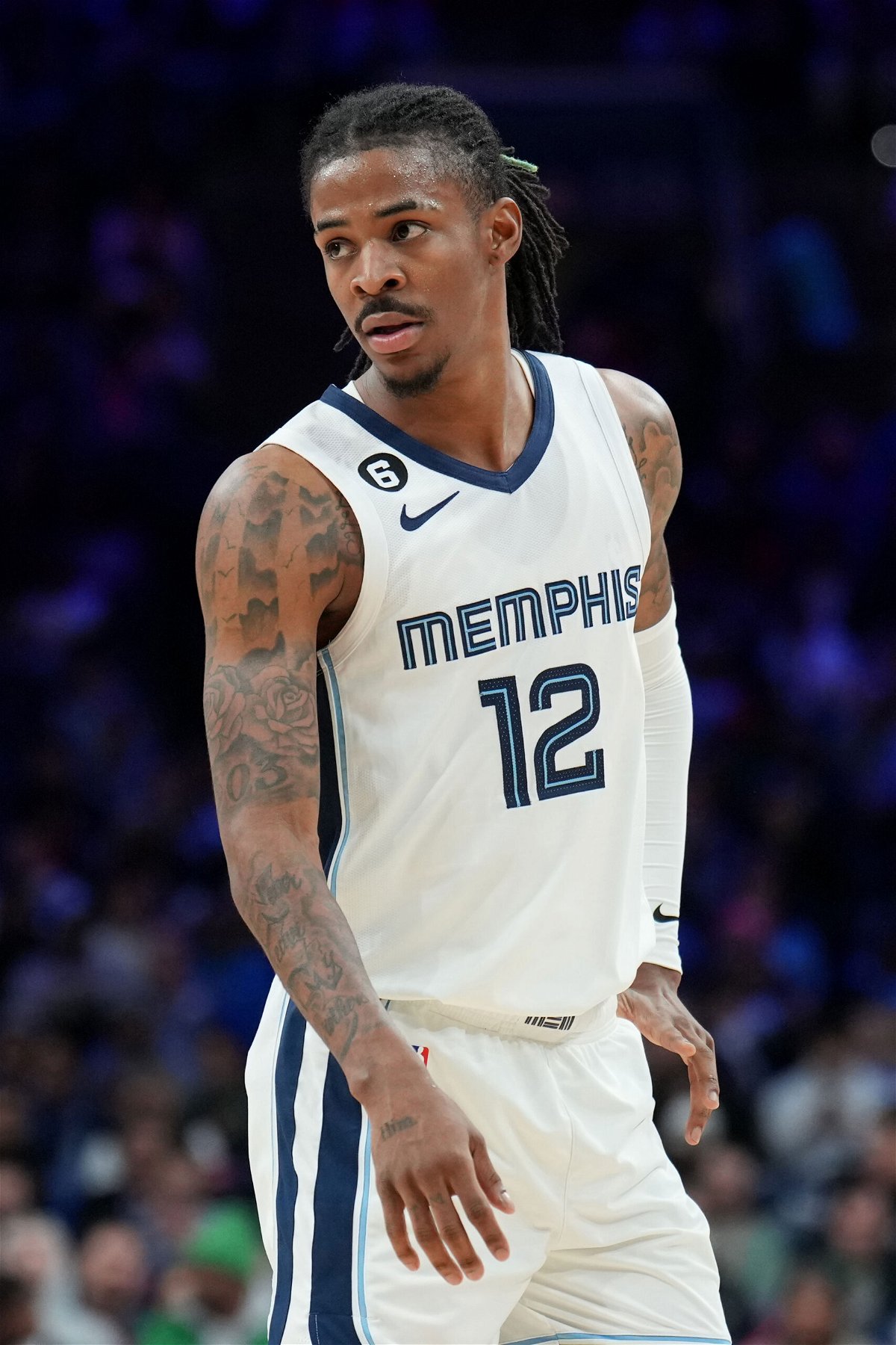 <i>Jesse D. Garrabrant/NBAE/Getty Images</i><br/>Ja Morant #12 of the Memphis Grizzlies looks on during the game against the Philadelphia 76ers on February 23 at the Wells Fargo Center in Philadelphia. The NBA's Memphis Grizzlies announced on March 4 that Morant 