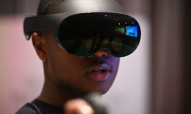 A Meta employee demonstrates the Meta Quest Pro VR Headset in Las Vegas