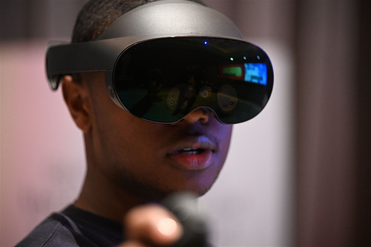 <i>Robyn Beck/AFP/Getty Images</i><br/>A Meta employee demonstrates the Meta Quest Pro VR Headset in Las Vegas