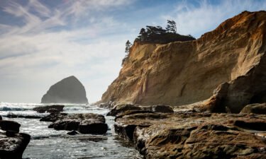 Henry Minh Hoang was hiking in an area known as "the punch bowl" in the Cape Kiwanda State Natural Area (pictured here) when he slipped and fell about 20 feet to the water's edge.