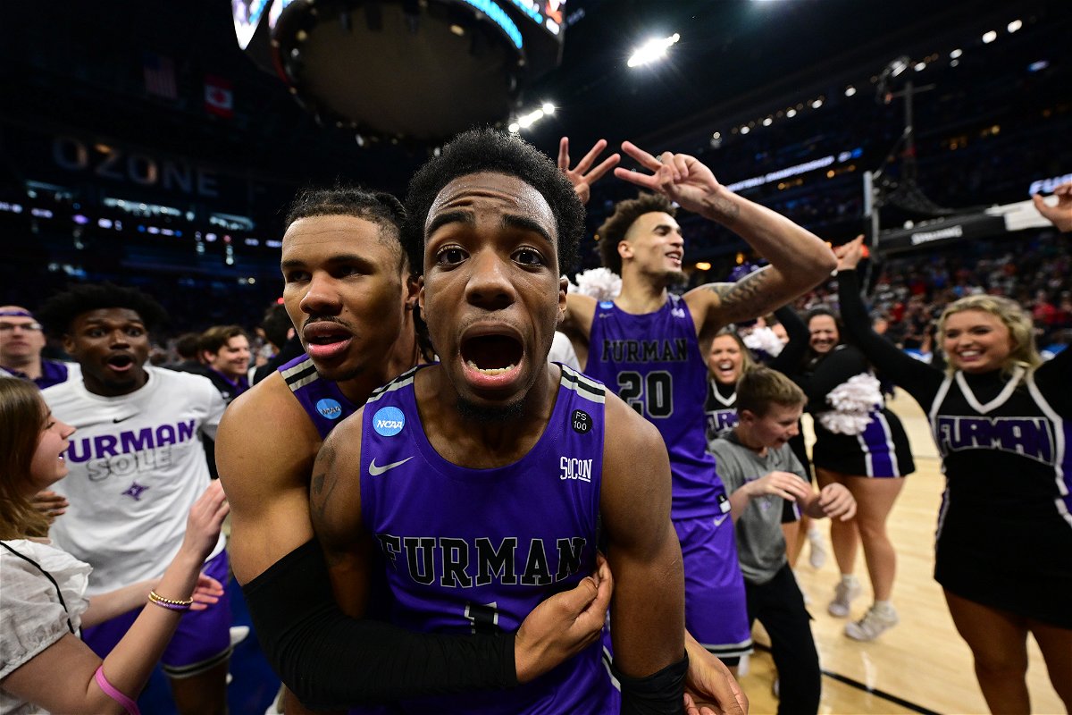 <i>Ben Solomon/NCAA Photos/Getty Images</i><br/>JP Pegues scored the game-winning three as the Furman Paladins upset the Virginia Cavaliers in the first round of the 2023 NCAA Division I men's basketball championship.