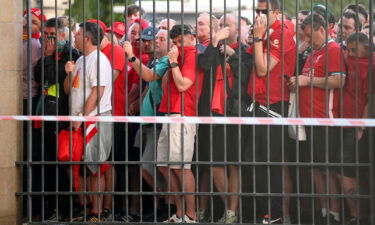 Liverpool fans queue outside the Stade de France prior to last year's Champions League final. UEFA plans to refund all Liverpool supporters who had tickets for the 2022 Champions League Final in Paris